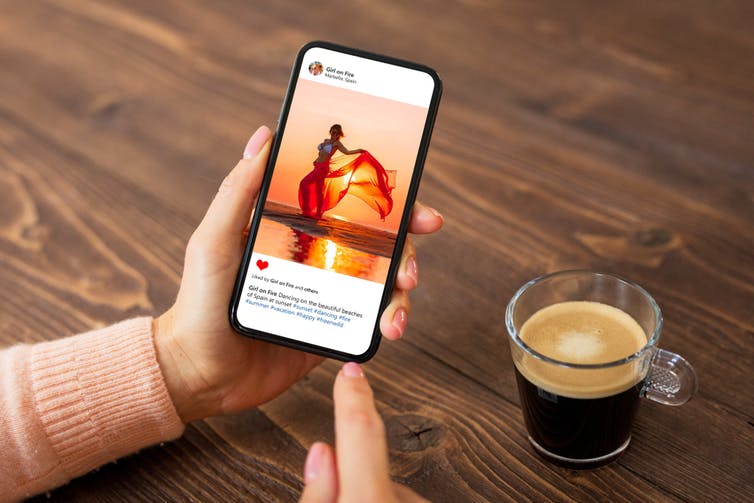 Person looks at a social media post from a woman, on their mobile.