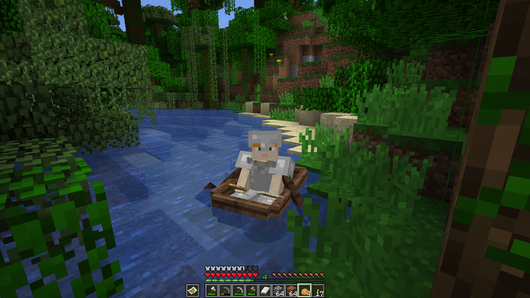 A minecraft character on a screen rowing a boat, surrounded by greenery