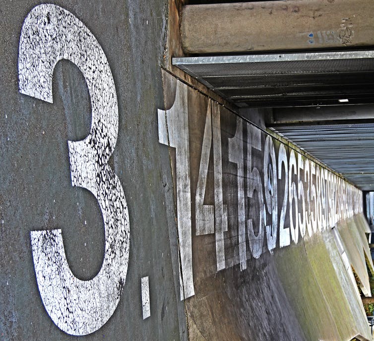 Pi written on roadside concrete fence