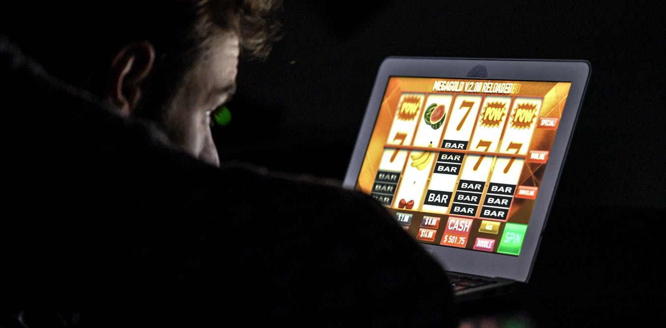 Gamblers bet more when in the dark: feedback can curb their online losses