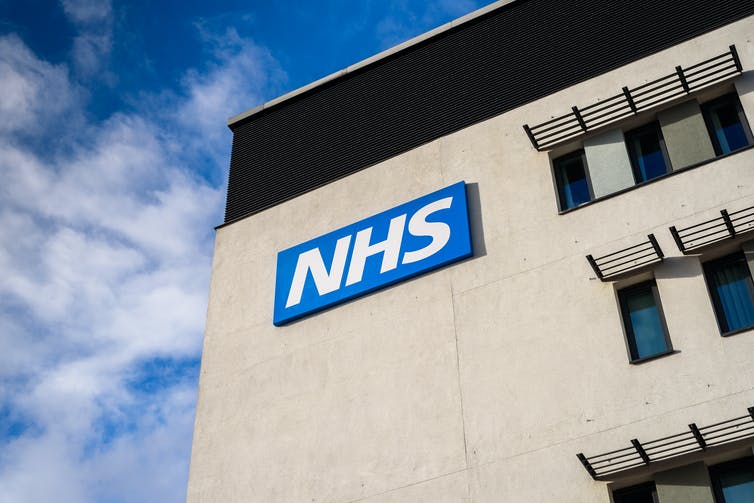 An NHS building bearing the NHS logo