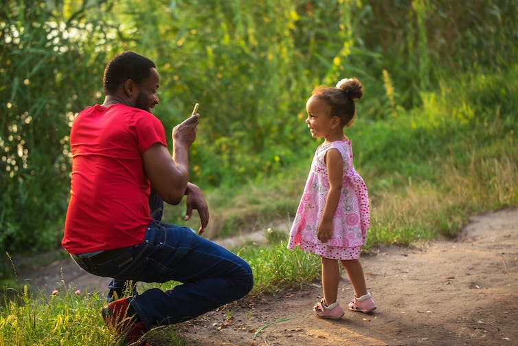 Father takes photo of daughter