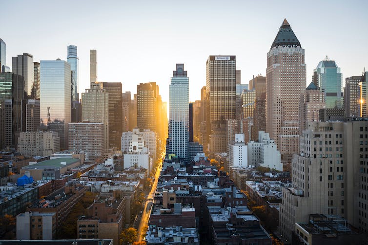 A view of high-rise buildings with afternoon sunlight.