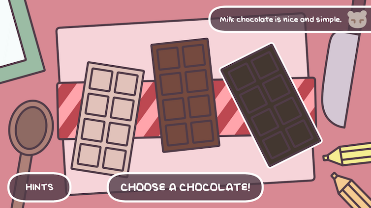 There are three chocolates on the table, white, milk, and dark, and a wooden spoon and a spatula. The game asks you to choose a chocolate.