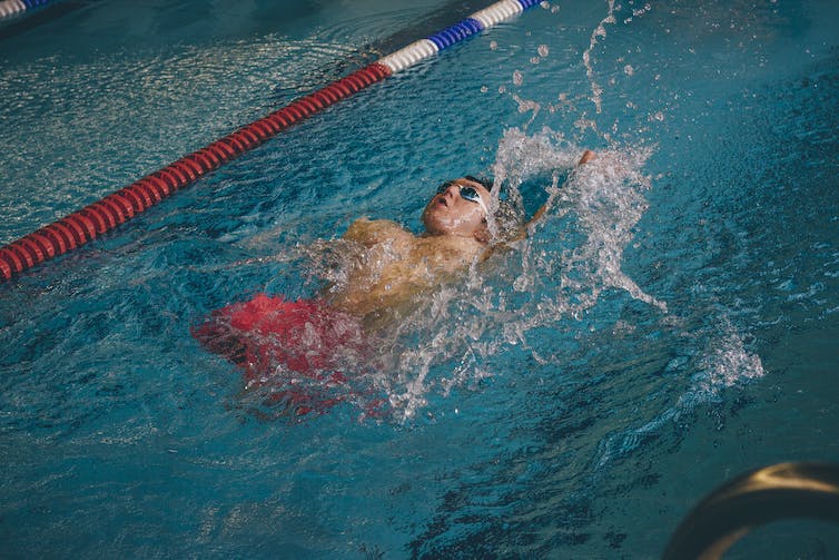 Person doing backstroke