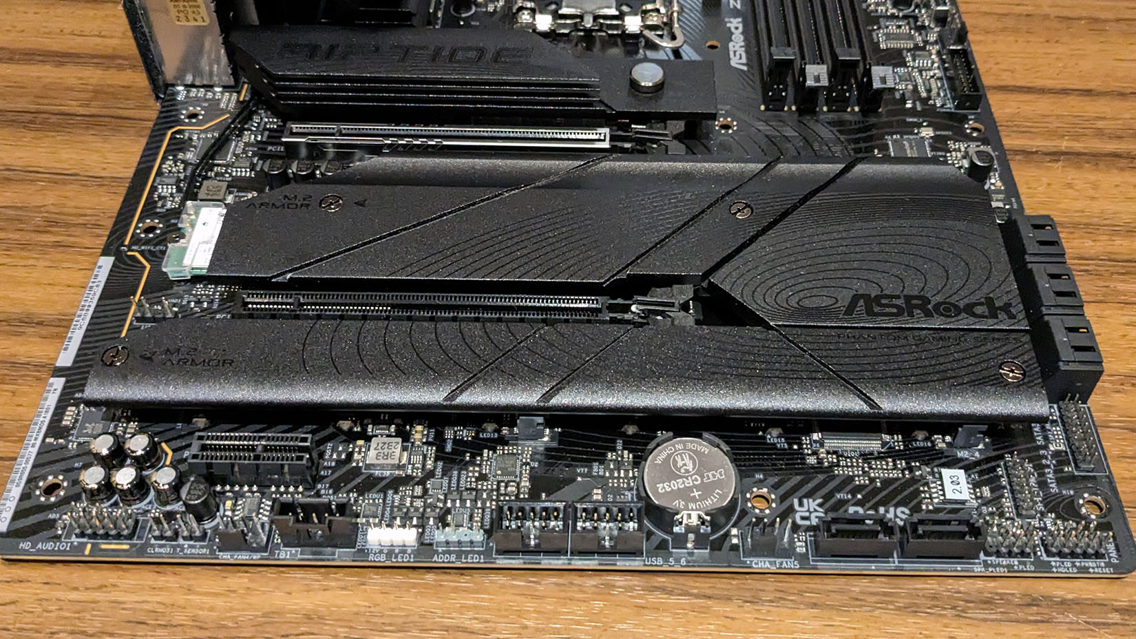 ASRock Z790 Riptide WiFi M.2 heatsinks and PCIe slots