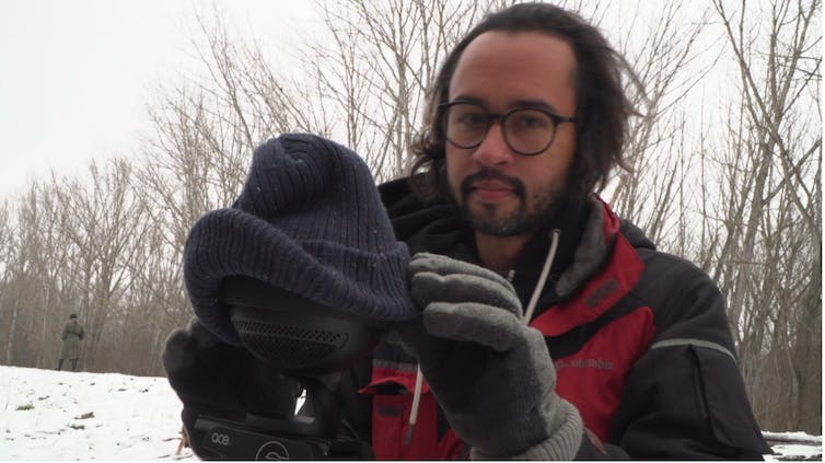 A beanie on a camera.