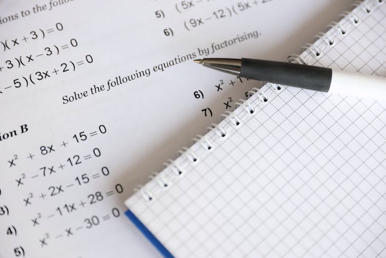 Workbook showing equations to solve