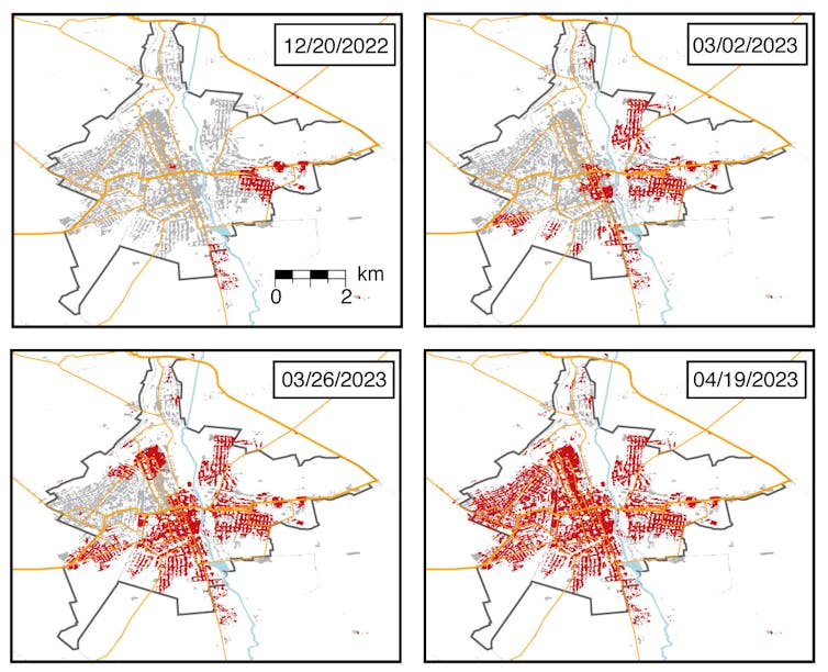 four maps of a city with increasing amounts of the buidlings marked in red