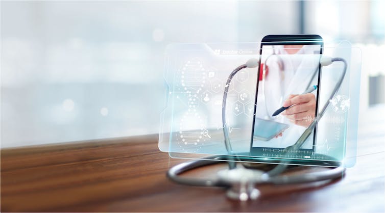 A smartphone with a stethoscope and an image of a white coat on the screen