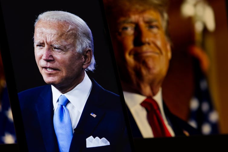 President Joe Biden in the foreground with Donald Trump in the background.