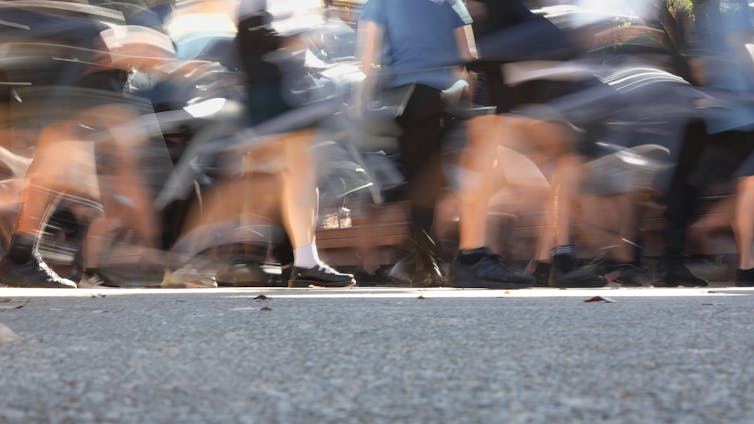 School children in a blur.