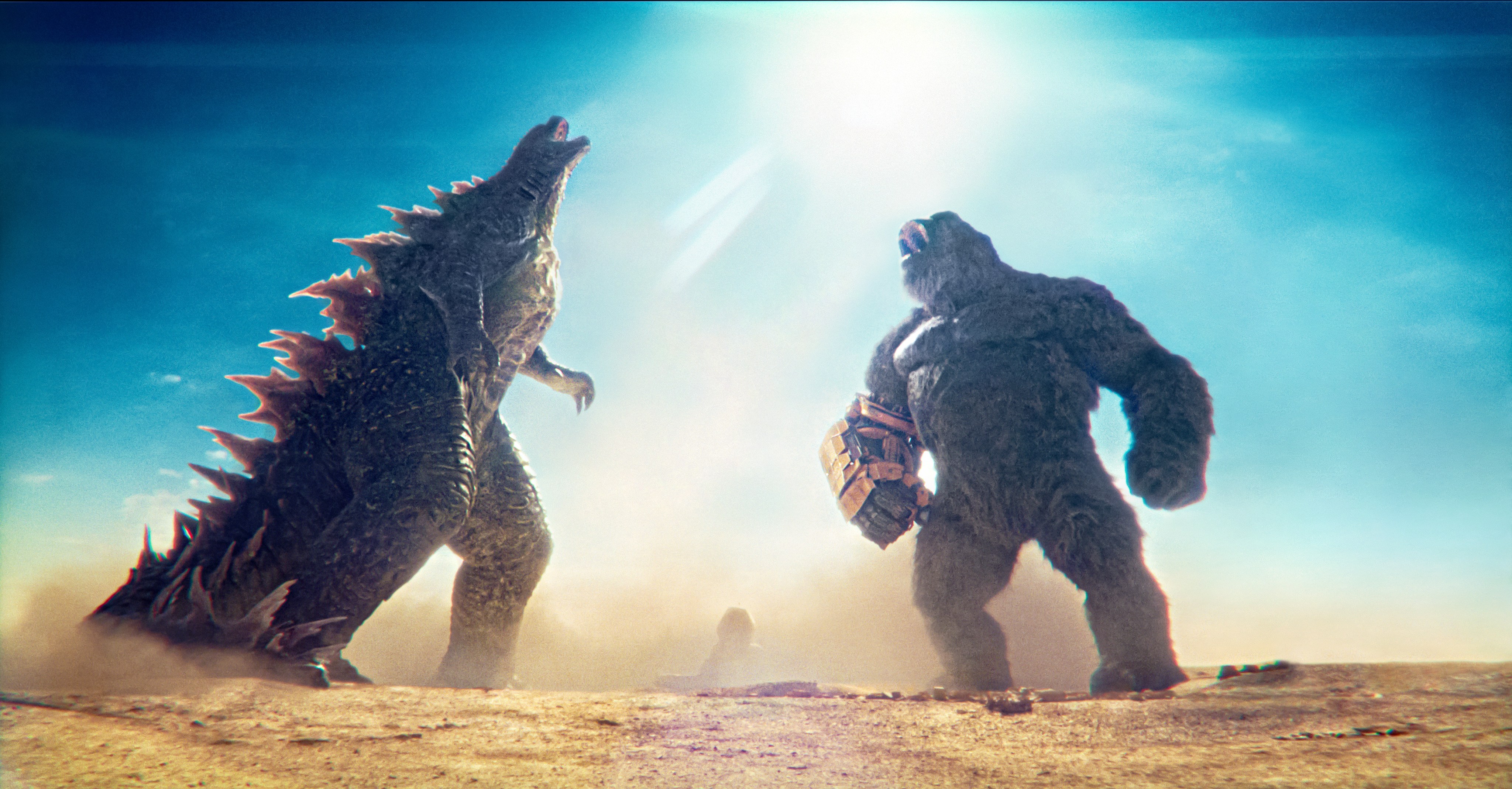 Godzilla and King Kong roar at the sky together in Godzilla x Kong: The New Empire