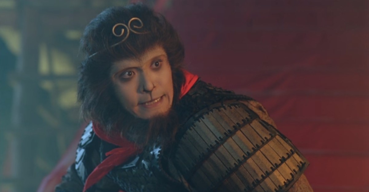 A humanoid monkey looks toward the camera wearing armor and a red handkerchief in A Chinese Odyssey Part Two: Cinderella