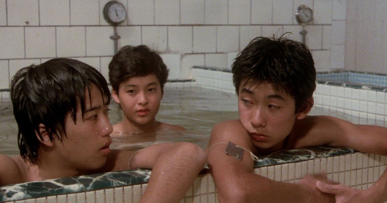 Three teenagers in a communal bathtub in P.P. Rider.