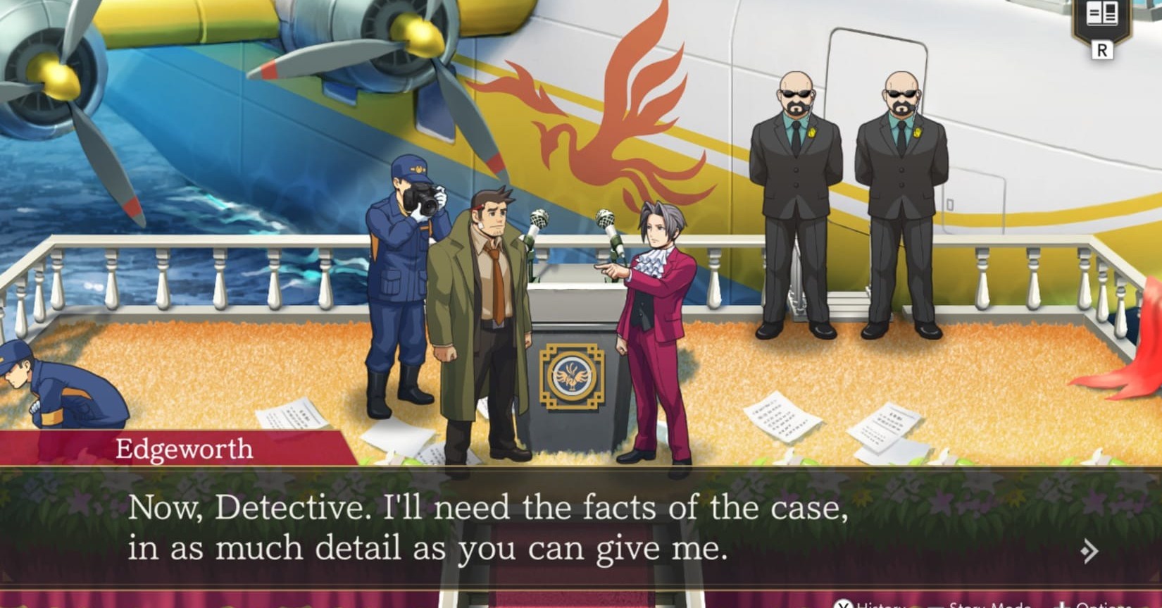 A wide shot of Miles Edgeworth pointing at a man and saying, “Now, Detective. I’ll need the facts of the case, in as much detail as you can give me.” In the background, there’s a crashed plane in some water, two guards in sunglasses, and forensics specialists analyzing the scene and taking photos.A wide shot of Miles Edgeworth pointing at a man and saying, “Now, Detective. I’ll need the facts of the case, in as much detail as you can give me.” In the background, there’s a crashed plane in some water, two guards in sunglasses, and forensics specialists analyzing the scene and taking photos.