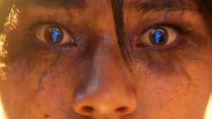 A close up shot of Diablo 4 Vessel of Hatred character Neyrelle's eyes with a blue shard reflection