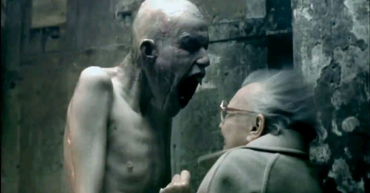 A tall, emaciated man screaming in the face of a woman in the music video for Aphex Twin’s Come to Daddy.