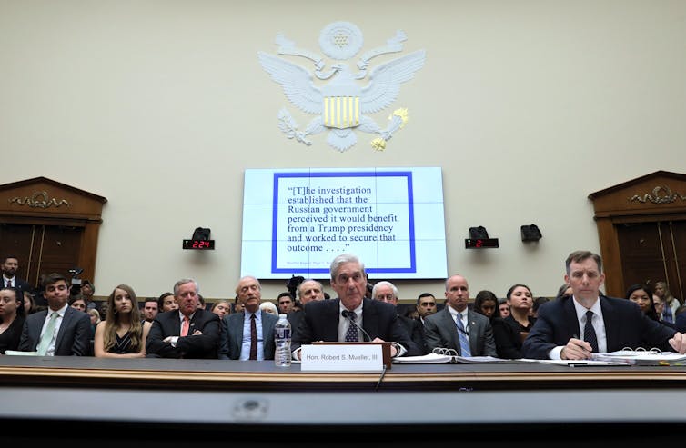 Robert Mueller testifying in Congress.